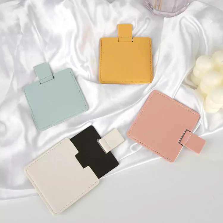 Fickspegel i kreditkortsstorlek